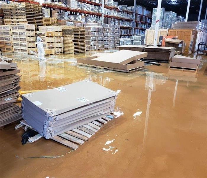 Warehouse flooded by water due to heavy rain
